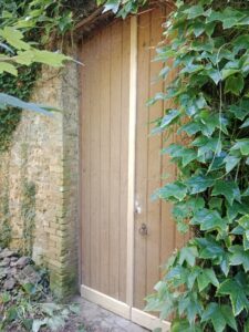 Porte de grange avant rénovation - ETS SEVIN