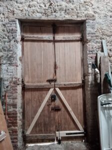 Résultat final rénovation porte de grange - ETS SEVIN